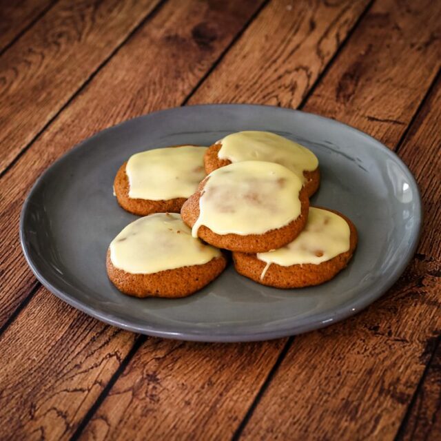 a plate of applesauce cookies with brown butter glaze