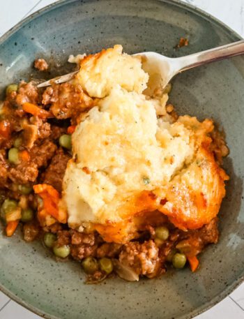 A serving of gluten free cottage pie in a bowl.