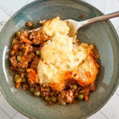 A serving of gluten free cottage pie in a bowl.