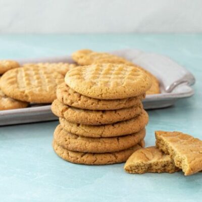 A stack of gluten-free peanut butter cookies.