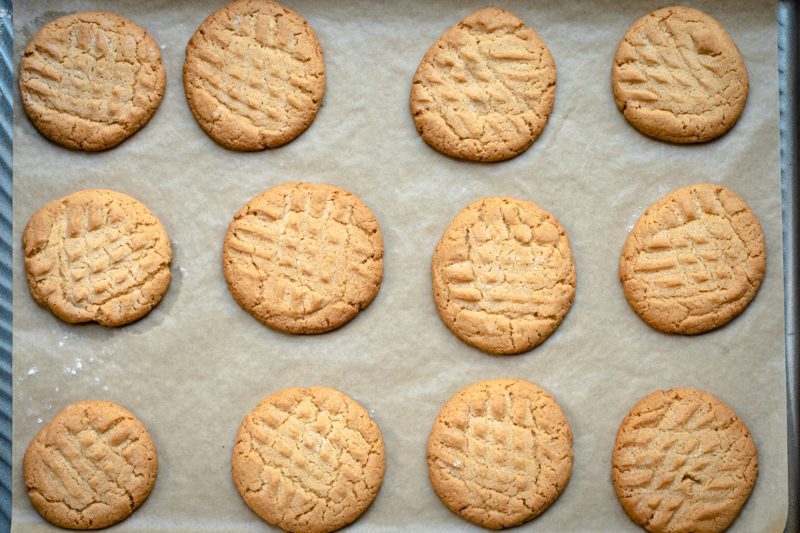 baking sheet with baked gluten free peanut butter cookies