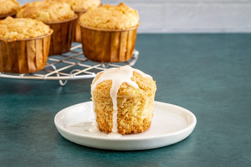 gluten free pineapple muffins with a drizzle of icing