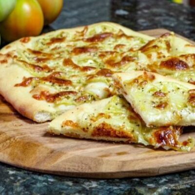 green tomato pizza on homemade crust