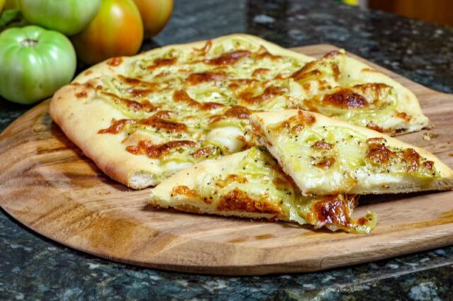 green tomato pizza on homemade crust