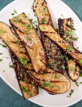 grilled chinese eggplant with sesame seeds garnish