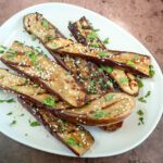 grilled chinese eggplant on a plate