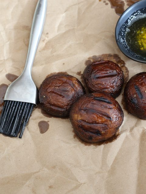 grilled mushrooms with basting sauce and brush