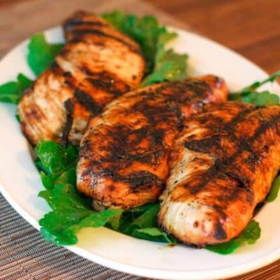 marinated and grilled turkey tenderloins on a platter