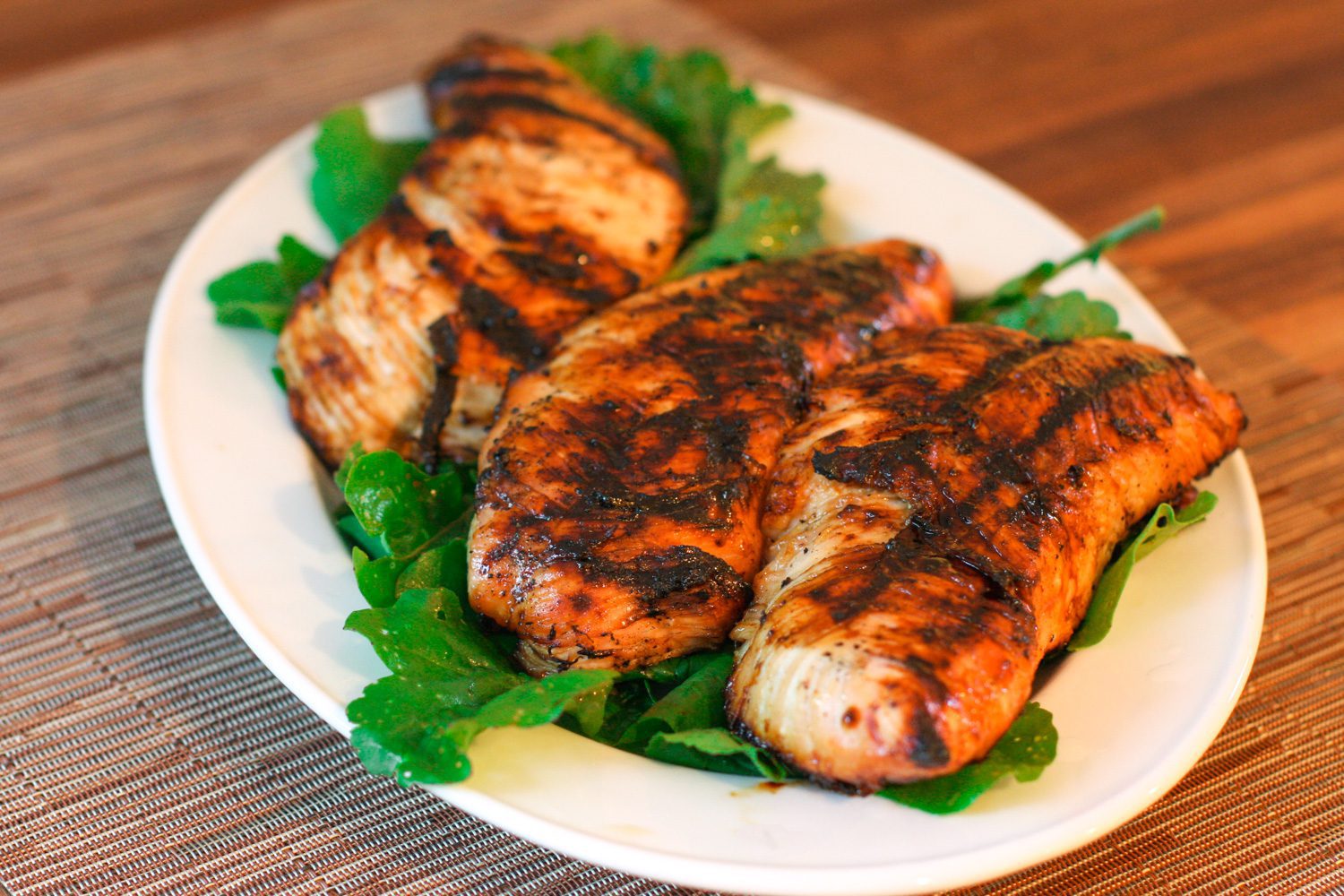 marinated and grilled turkey tenderloins on a platter