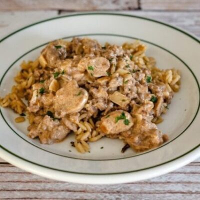 ground beef stroganoff over rice with sour cream sauce and mushrooms