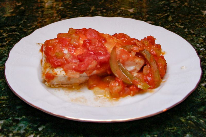 halibut with creole sauce on a plate