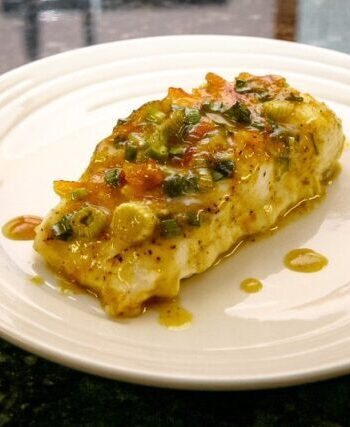Halibut with a green onion and curry topping