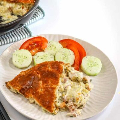 Baked chicken pot pie with a golden crust and creamy filling.