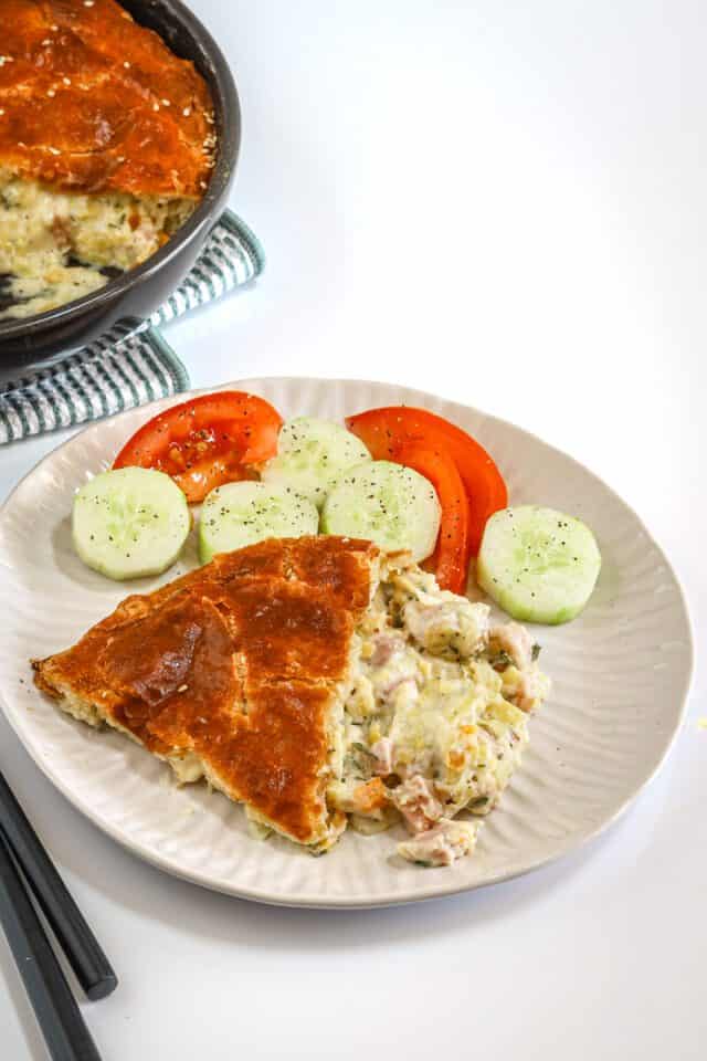 Baked chicken pot pie with a golden crust and creamy filling.