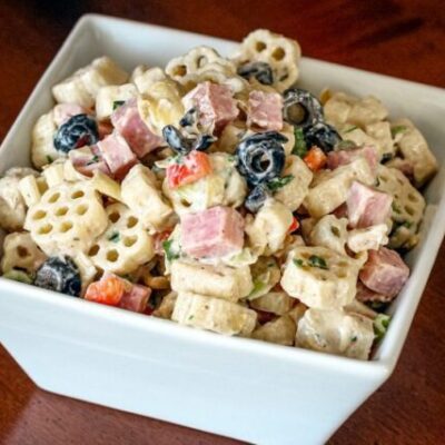 pasta salad with marinated artichokes, ham, and olives