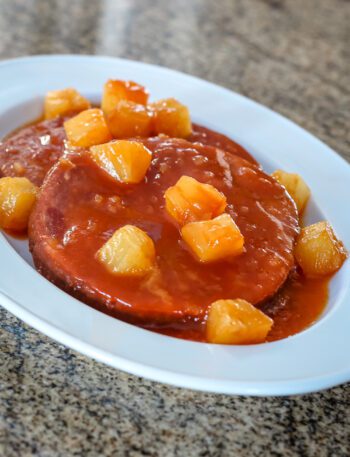 ham steaks with pineapple on a platter