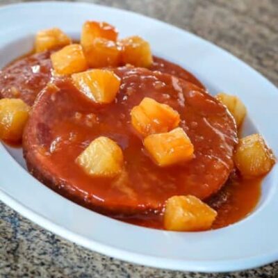 ham steaks with pineapple on a platter