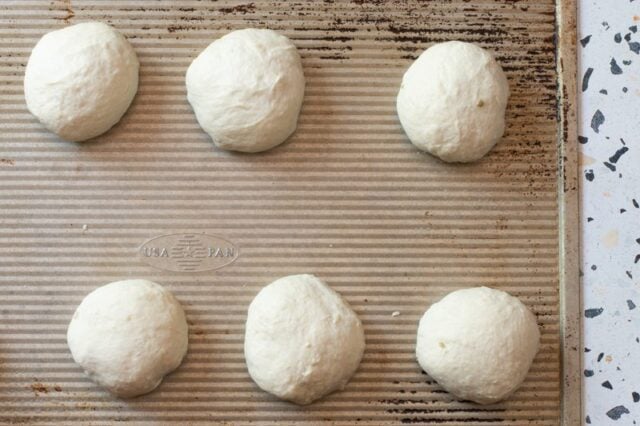 bialys prep, dough balls on baking sheet