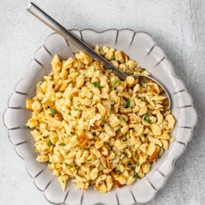 A plate of homemade spaetzle sautéed with butter.