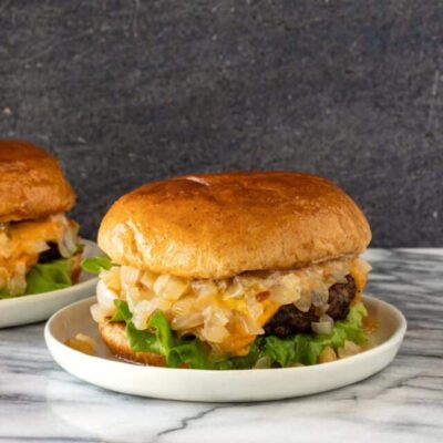 A delicious, buttery Wisconsin butter burger with sauteed onions, lettuce, and cheese.
