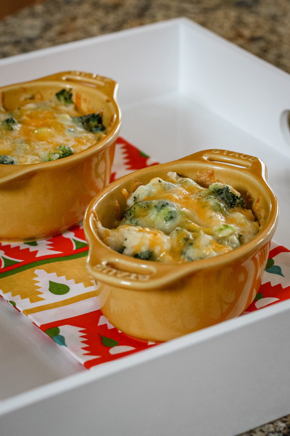 broccoli, rice, and cheese casseroles baked in mini cocottes