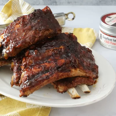 Smoked pork ribs glazed with barbecue sauce.