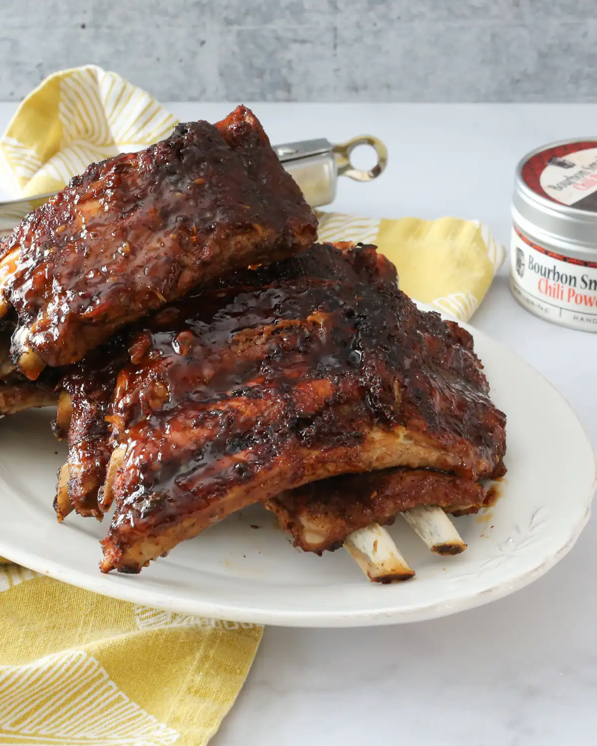Smoked pork ribs glazed with barbecue sauce.
