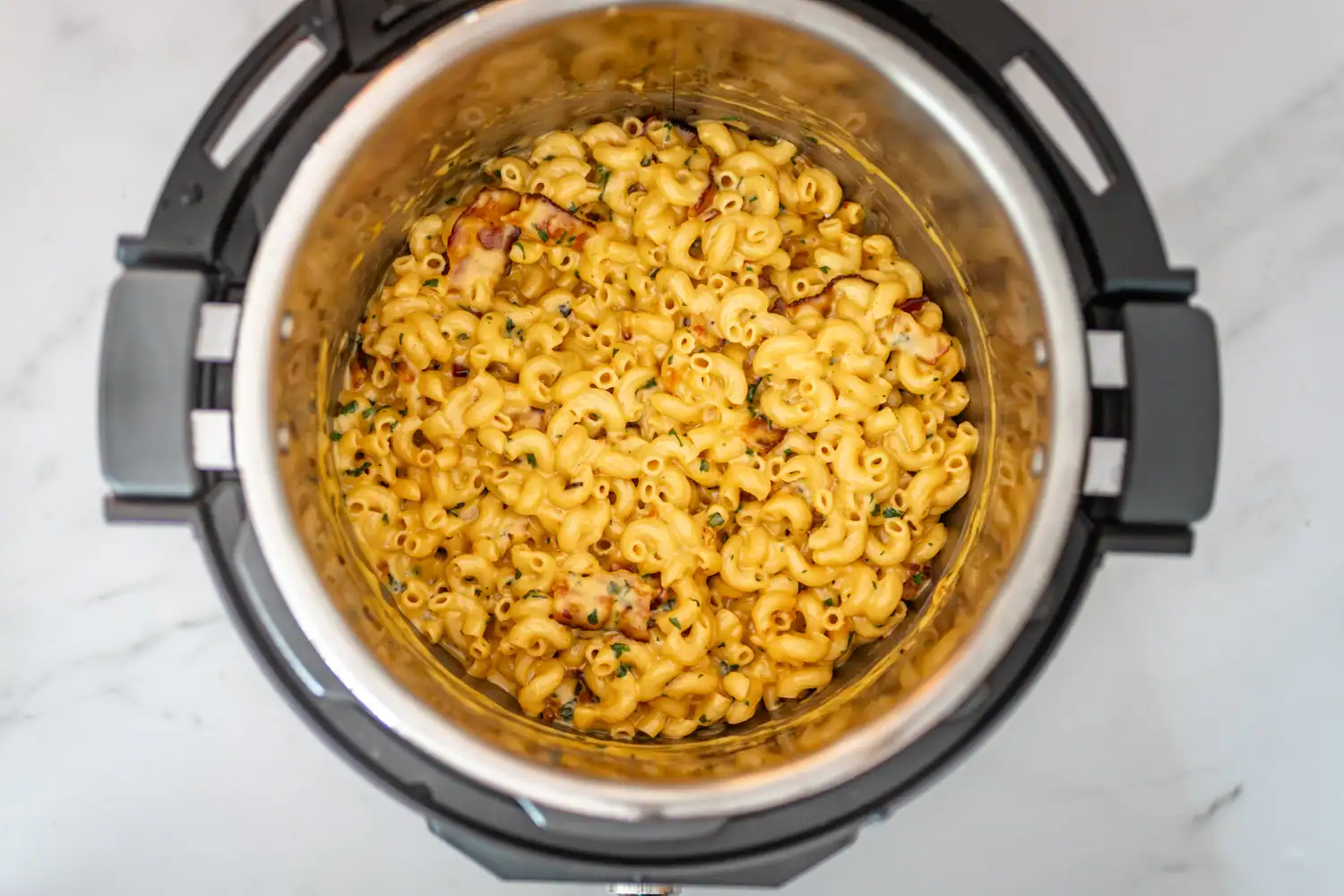 Macaroni and cheese with bacon in the Instant Pot pressure cooker.