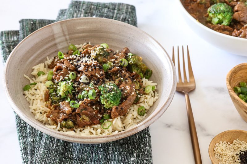 Instant Pot beef and broccoli served over hot cooked rice