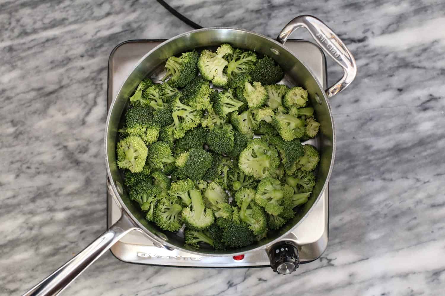 Broccoli steaming for beef and broccoli dish.