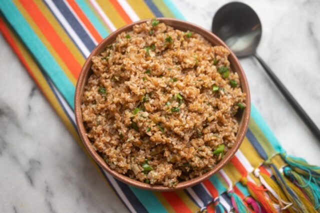 instant pot bulgur pilaf in a serving bowl