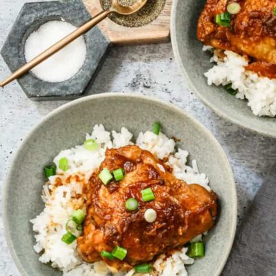 Seasoned salt and pepper in small bowls.