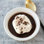 instant pot pots de creme with a dollop of whipped cream