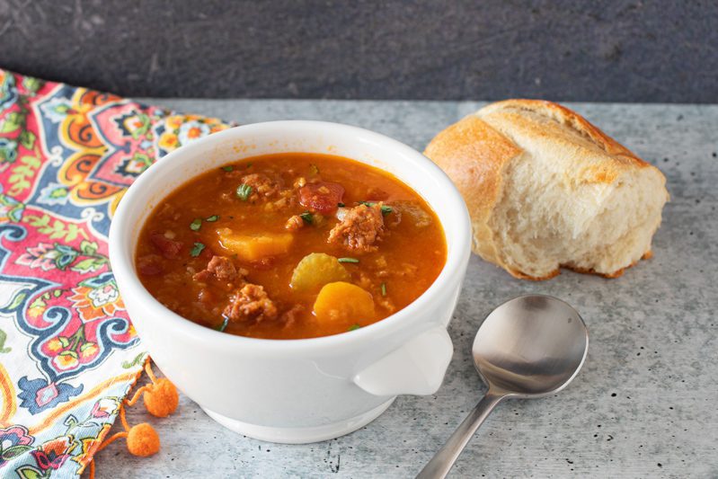 a bowl of instant pot chorizo and lentil soup.