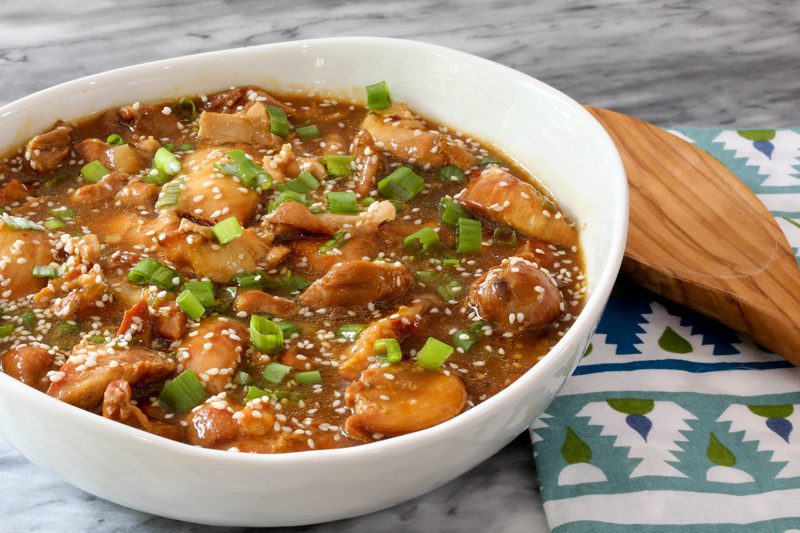 instant pot honey sesame chicken thighs, in a serving bowl
