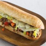 instant pot italian beef sandwich with provolone cheese and giardiniera