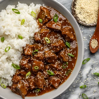 File: beef-stew-over-rice.jpg.