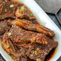 A serving platter with Korean-inspired Instant Pot beef short ribs.