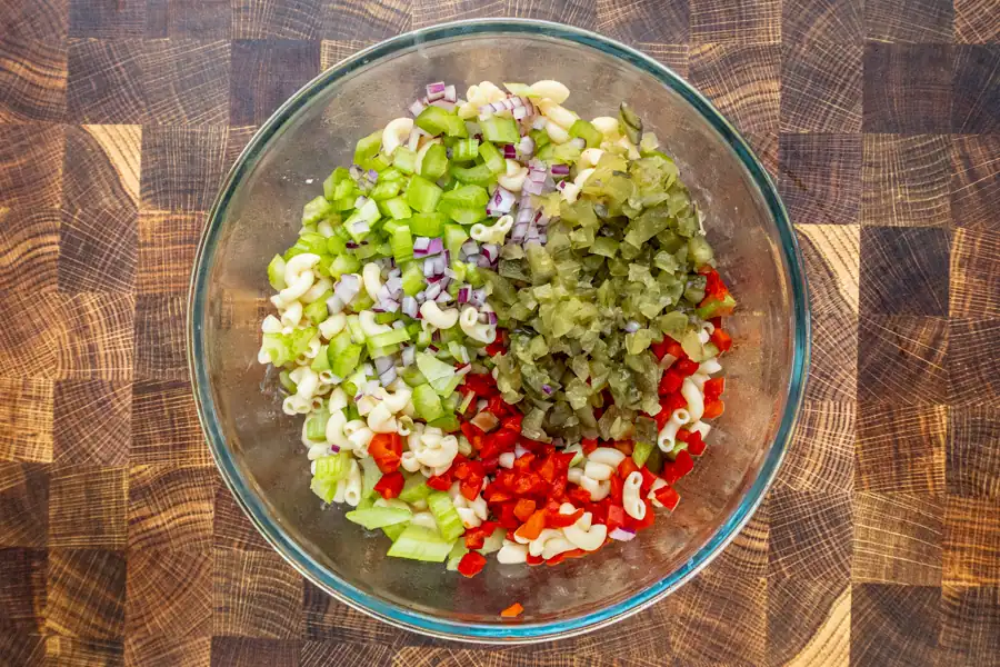 Instant Pot macaroni salad prep: combine ingredients.