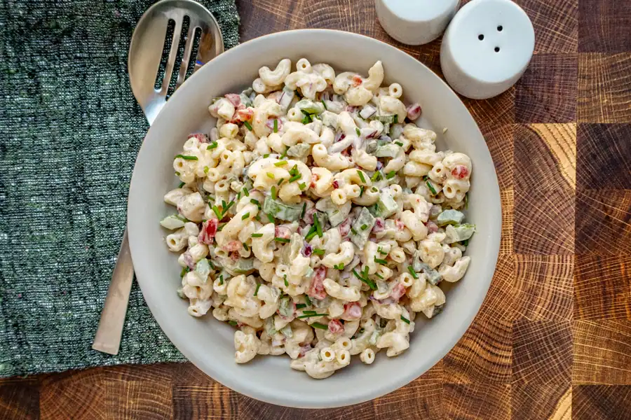 Macaroni salad in a serving bowl.