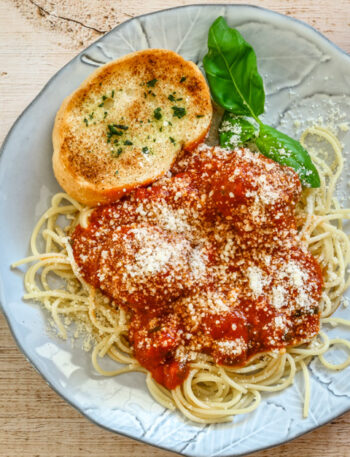 Meatballs and sauce cooked in the Instant Pot, on pasta.