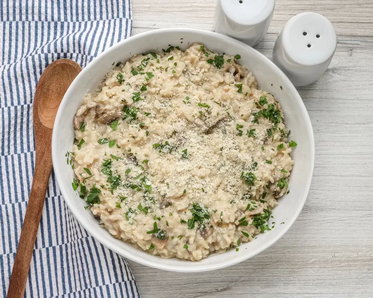 Instant Pot mushroom risotto with Parmesan cheese and parsley.