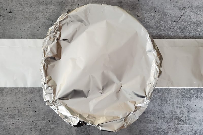 Cover the pan with foil