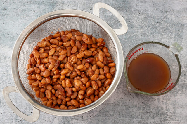 Drain the beans, reserving 1 cup of the cooking liquid.