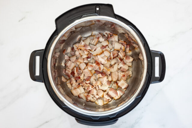 Sauté the bacon in the Instant Pot.