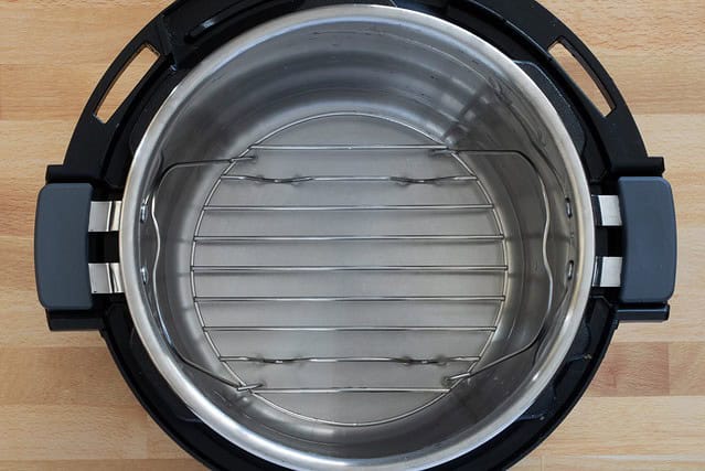 Instant Pot with a trivet and water.