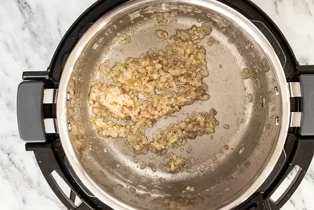 Sauteing the shallots and garlic for Instant Pot risotto.