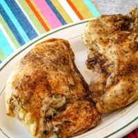 Instant Pot chicken breasts on a serving platter.
