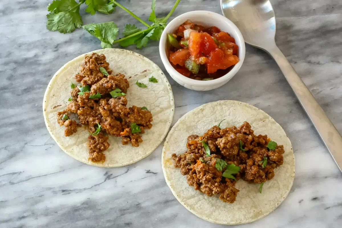 Making soft tacos with Instant Pot taco meat.