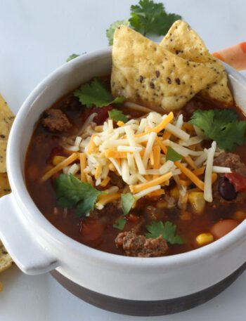 instant pot taco soup with tortilla chops and cheese